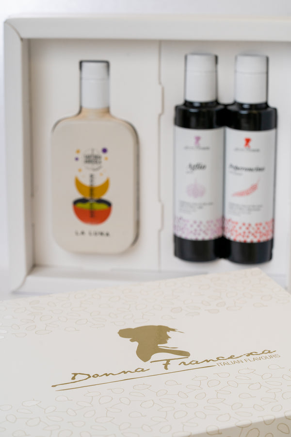 Donna Francesca Trio olive oil gift box with three flavors: spicy, garlic, and classic extra virgin